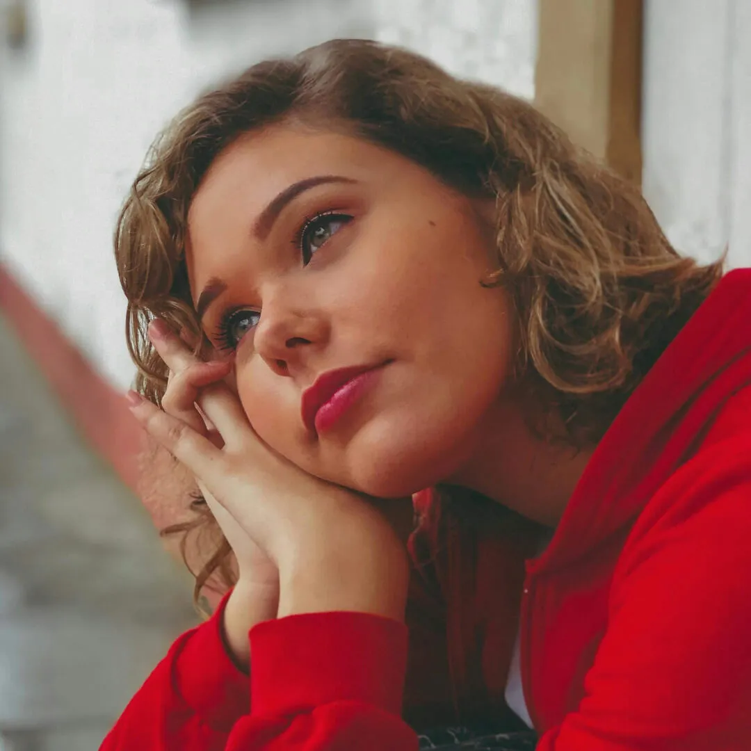 Thoughtful woman looking away.