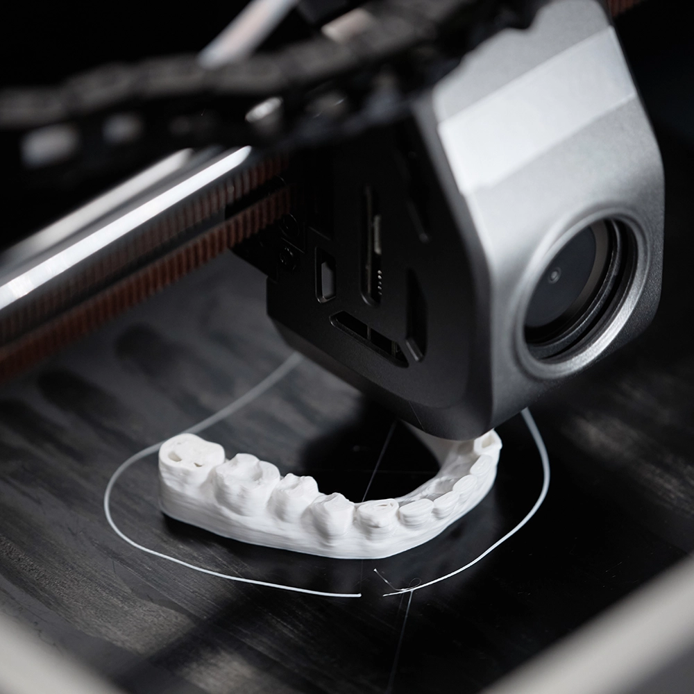 3D dental printer used for creating dental models or restorations.