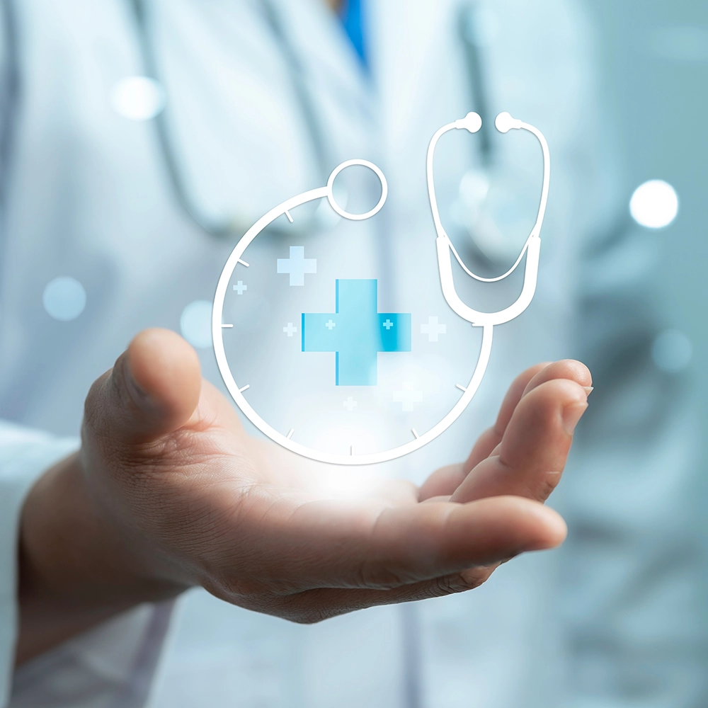 Hand with a medicine cross and stethoscope above it.