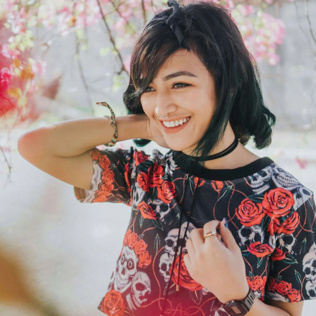 A woman smiling.